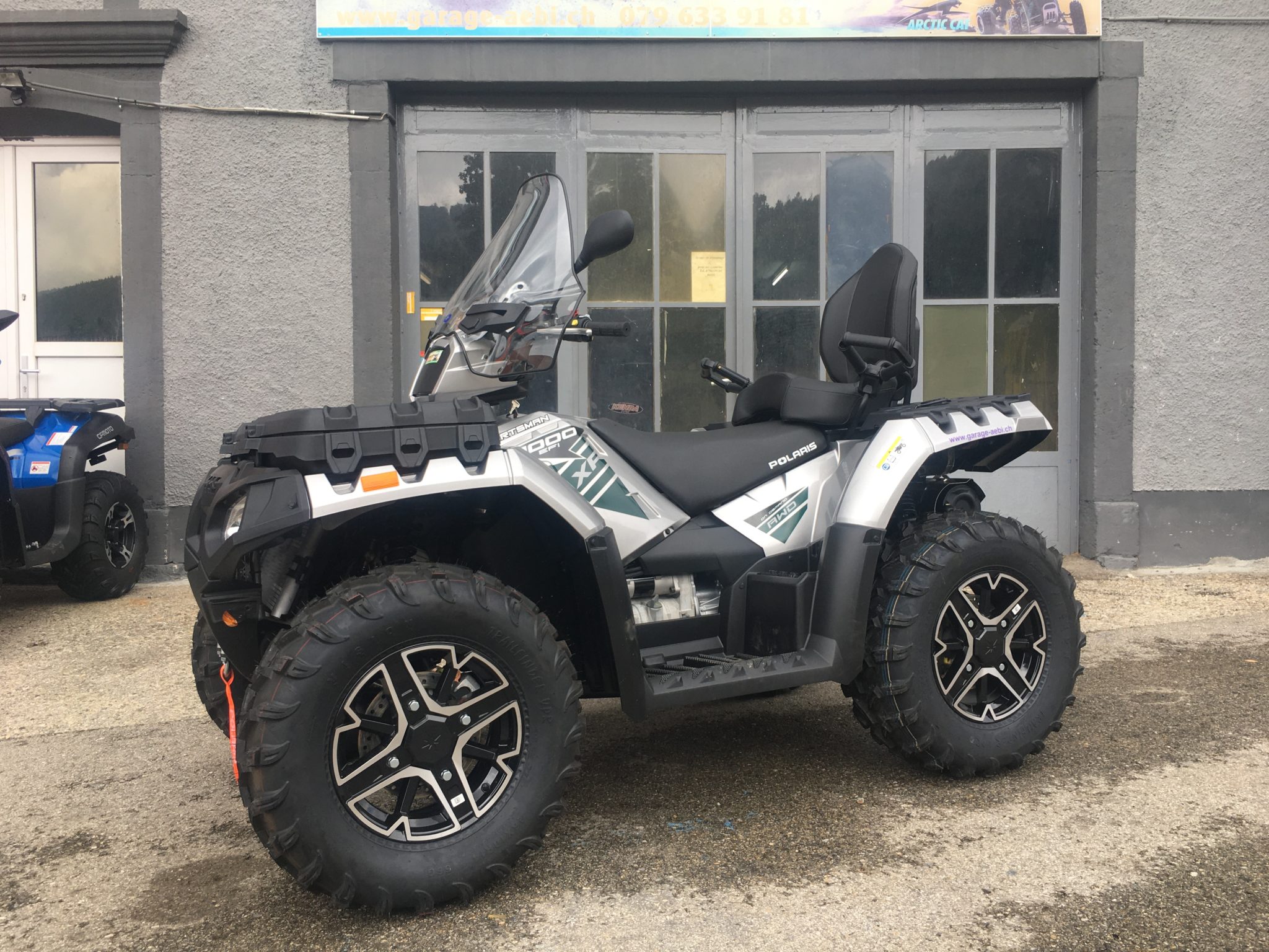 la gammes des quads Polaris Garage Aebi Quad moto neige voiture machines agricoles